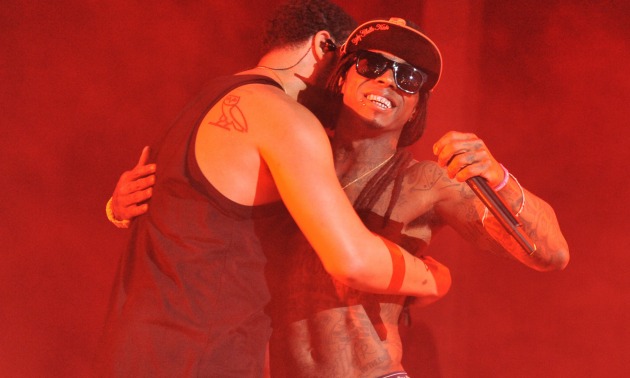 lil wayne hugging drake